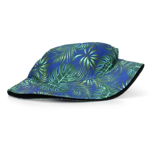 Navy blue bucket hat with green palm and monstera leaf print for sun protection