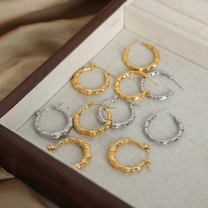 Vintage gold and silver bamboo style hoop earrings made of durable titanium steel