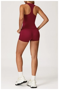 Rear view of a burgundy yoga set featuring a racerback tank top and high-waist sports shorts