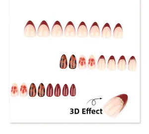 Detailed 3D effect on tortoise shell and floral press-on nails with French tip design