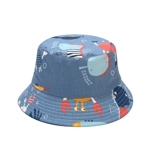 Blue reversible sun hat with colorful cartoon sea creature prints for outdoor protection