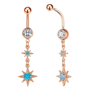 Detail of rose gold belly button ring with star pendant and inlaid blue cubic zirconia