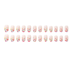 Pastel candy color press-on nails set with sweet polka dot pattern on white background