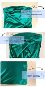Dettaglio dell'abito in raso verde smeraldo con scollo e trama liscia dell'orlo