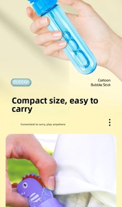 Mini dinosaur bubble stick showing compact portable size fitting easily in pocket
