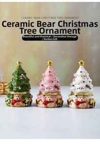 Detailed view of ceramic Christmas tree boxes featuring bear motifs and metal clasps