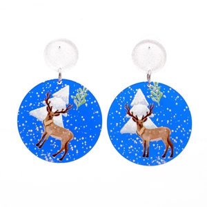 Détails des boucles d'oreilles de Noël rondes bleues avec motifs rennes et neige