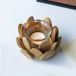 Artisan lotus shaped driftwood candle holder with glass cup and natural wooden petal details