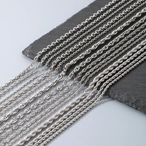 Macro view of various textured silver titanium steel chains and necklace links