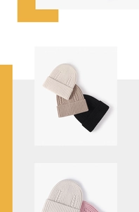Detailed cable knit texture of a warm winter beanie hat shown in multiple neutral colors