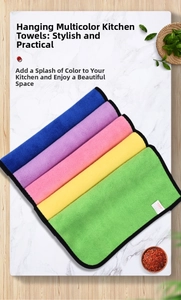 Macro detail of multicolored microfiber cleaning cloths with durable black stitched edges
