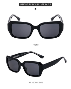 Front and side view of bright black acetate sunglasses with dark gray lenses