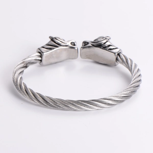 Silver 304 stainless steel twisted wire cable cuff bracelet with wolf head ends