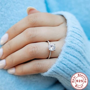 Macro detail of high-quality 925 sterling silver ring with a large sparkling solitaire diamond