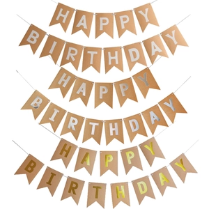 Kraft paper Happy Birthday banners with gold, silver, and white fishtail flags