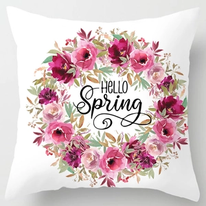 Macro detail of HELLO Spring floral wreath print on white peach skin pillowcase