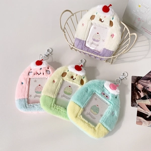 Macro detail of plush cartoon dessert photocard holders with cute cherry and animal embroidery