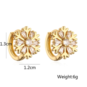 Detailed view of gold plated snowflake earrings with zircons measuring 1.3cm by 1.2cm
