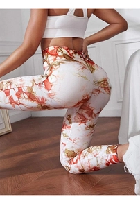 Detail of high-waist marble yoga pants highlighting the seamless peach lift effect