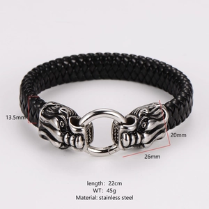 Detailed view of black leather woven bracelet with stainless steel dragon head clasp