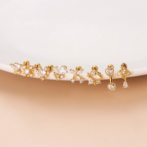 Set of eight gold stainless steel stud earrings with heart, butterfly and zircon designs