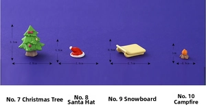 Miniature resin Christmas set with a tree, Santa hat, tiny sled and a bonfire scene