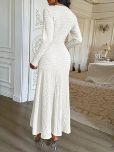 Elegant white short-sleeve maxi dress with A-line silhouette and textured fabric back view
