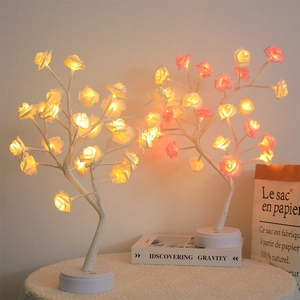 LED warm light rose tree lamp with white and pink flowers on a minimal round base