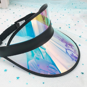 Macro detail of iridescent PVC sun visor with black elastic band and one size label