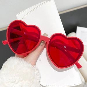 Fashionable heart-shaped red sunglasses for party wear with oversized plastic frame