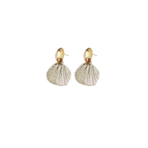 Golden shell-shaped stud earrings with radiating texture and oval metallic top design