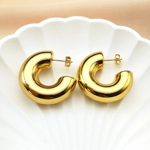 Minimalist gold-plated thick C-shaped hoop earrings with a high-polished mirror finish
