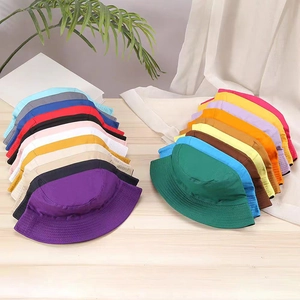 Detailed grid of double-sided cotton bucket hats in a wide range of vibrant colors