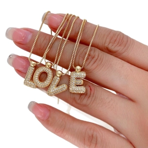 L-O-V-E letter necklaces with gold-plated finish and sparkling zircon pavé pendants