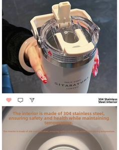 Detailed macro view of 304 stainless steel interior and cream-colored tumbler lid