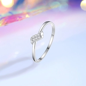 Elegant S925 sterling silver ring with double-row micro pavé diamonds on purple background