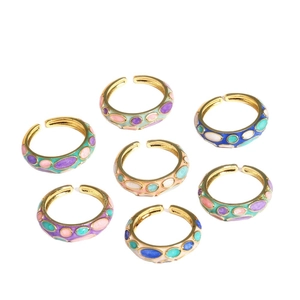 Set of 7 colorful enamel floral rings in gold finish with adjustable open bands