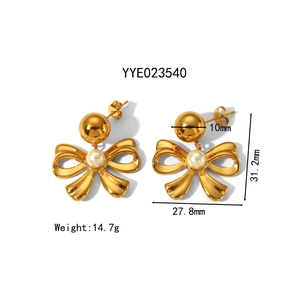 Elegant gold bow earrings with a central white pearl, showing 31.2mm size dimensions