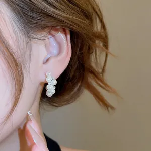 Elegant silver cluster stud earrings with white pearls and sparkling rhinestones for women
