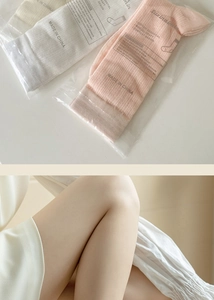 Detail of thin mesh crew socks in pink, white and beige colors with cotton material