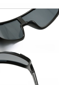 Detail view of lightweight nose pads and matte black hinge on cycling sunglasses