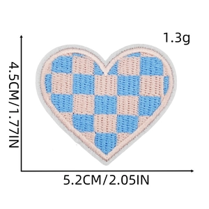 Detail of pink and blue checkered heart embroidery patch with size and weight specs