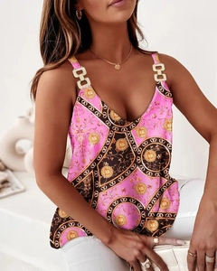 Detail of pink and black floral tank top with V-neck and golden chain shoulder straps