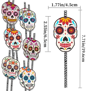 Biodegradable paper straws with colorful Day of the Dead skull toppers and striped pattern