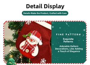 Detail of red knitted Christmas stocking with 3D snowman and plaid hat decoration
