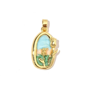 Detail of 18k gold plated oval pendant featuring enamel floral landscape and 3D flower