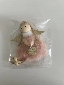 Pink plush Christmas angel ornament with golden glitter heart and wood bead in packaging