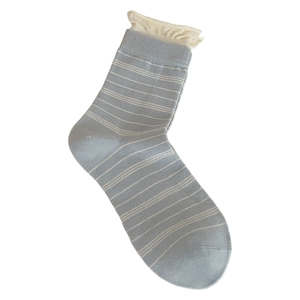 Light blue striped crew socks with cream white lace trim on a clean white background