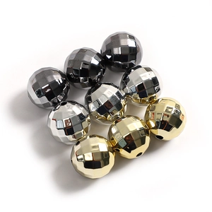 Detailed view of faceted CCB spacer beads in gold, silver, and gunmetal for DIY jewelry