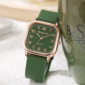 Square quartz watch with dark green silicone strap and rose gold numerals